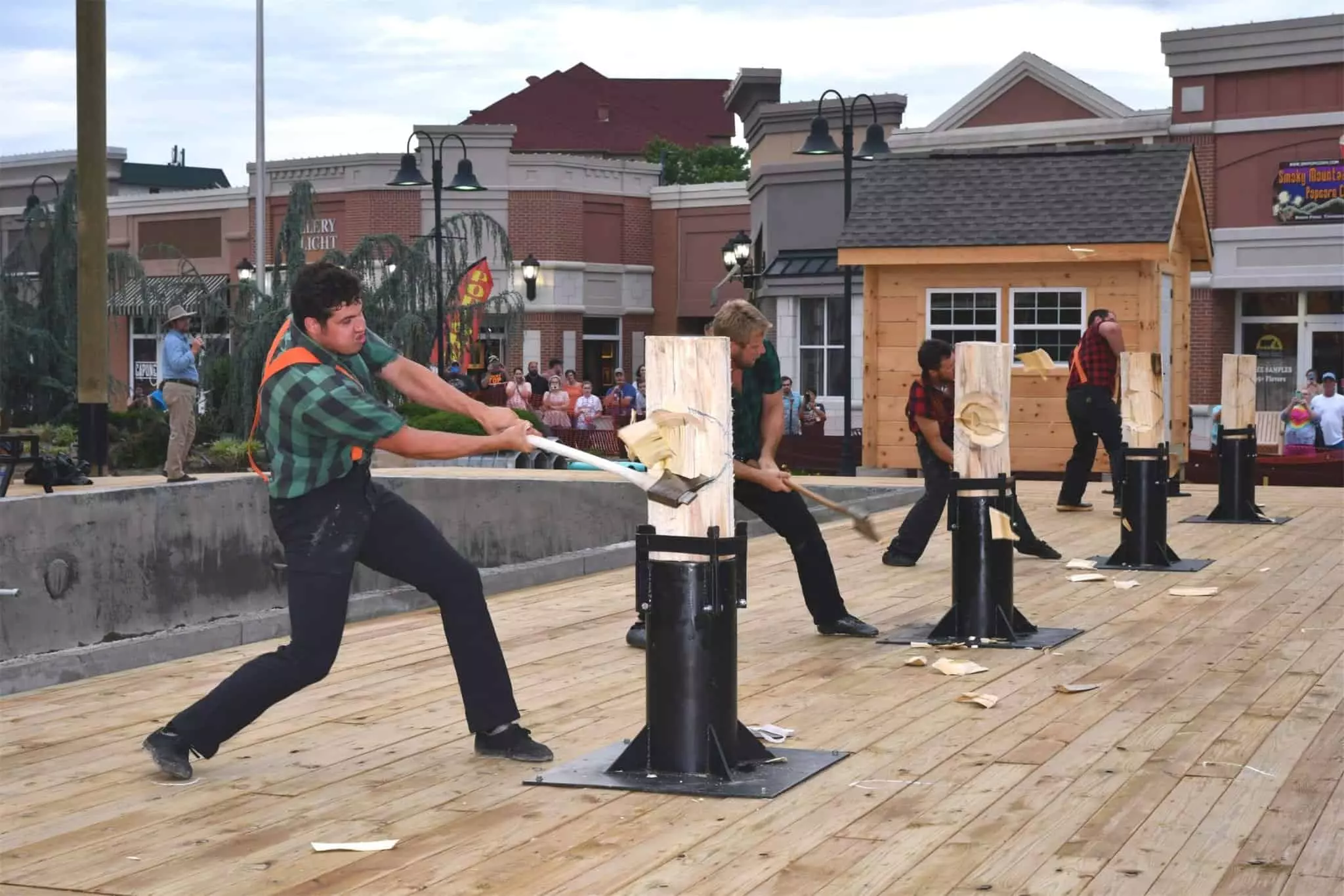 lumberjacks chopping at wood