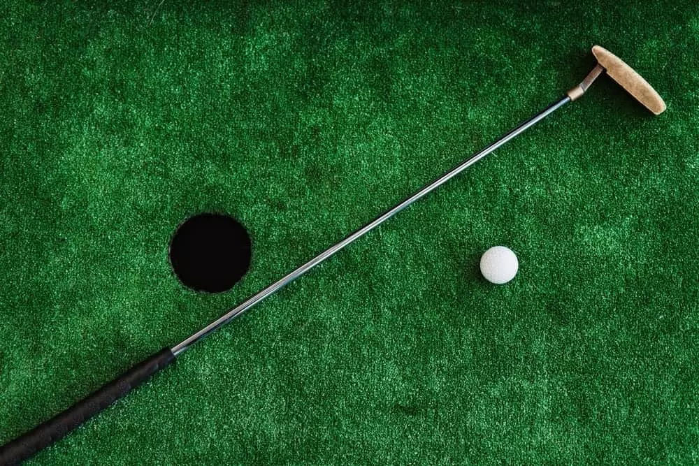golf club and ball indoors