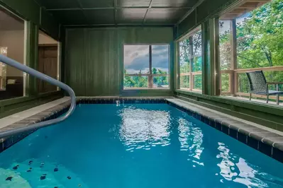 indoor pool with cloudy weather outside