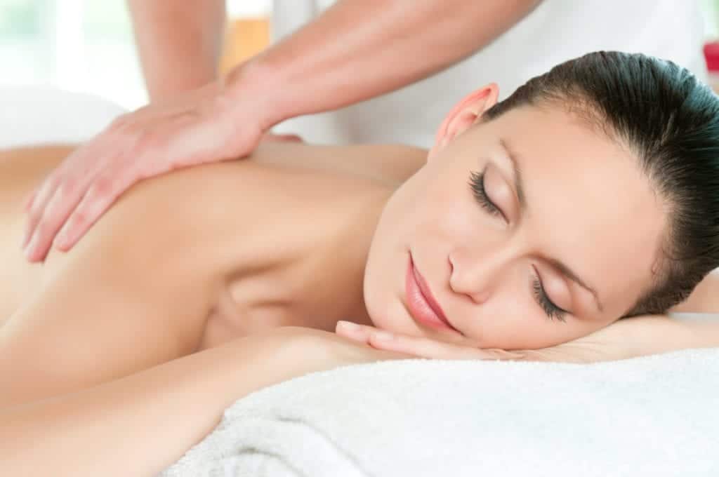 Woman getting a massage at the spa