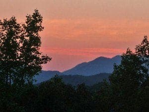 Red cloud in the sky over the Smoky Mountains at sunet