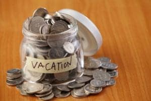 Vacation savings fund coin jar