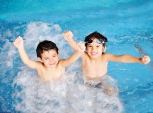 Young boys having fun in the indoor pool