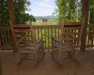 Two rocking chairs at a cabin in Gatlinburg overlooking the Smoky Mountains