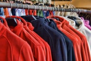 Row of fleece jackets in red and blue