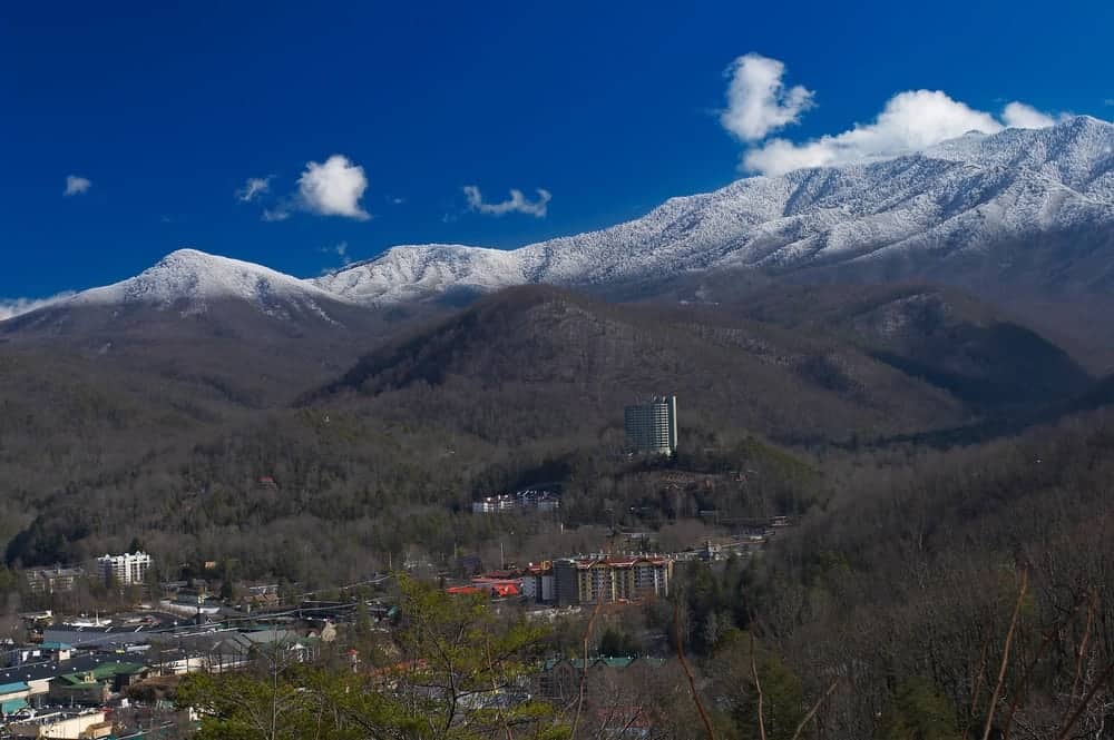 Snow on the mountaintops with a view of Gatlinburg