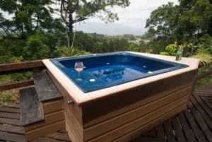 outdoor hot tub with wine glass