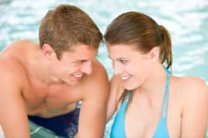 couple staying in a Gatlinburg vacation cabin wiht indoor pool
