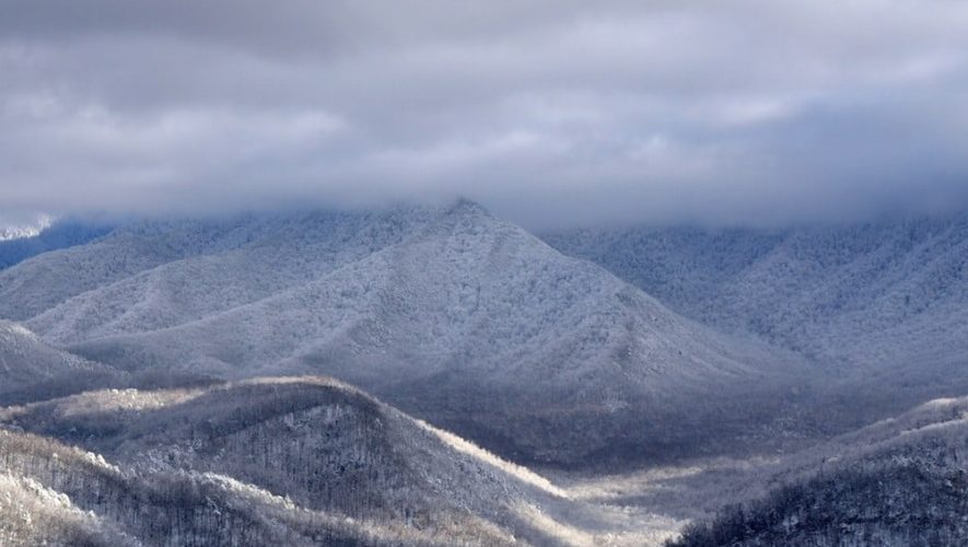 Photo of the snow covered mountains taken from a Pigeon Forge Tennessee cabin.