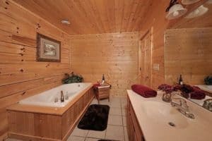 The bathroom in the Hawk's View cabin in Gatlinburg with a Jacuzzi tub. 