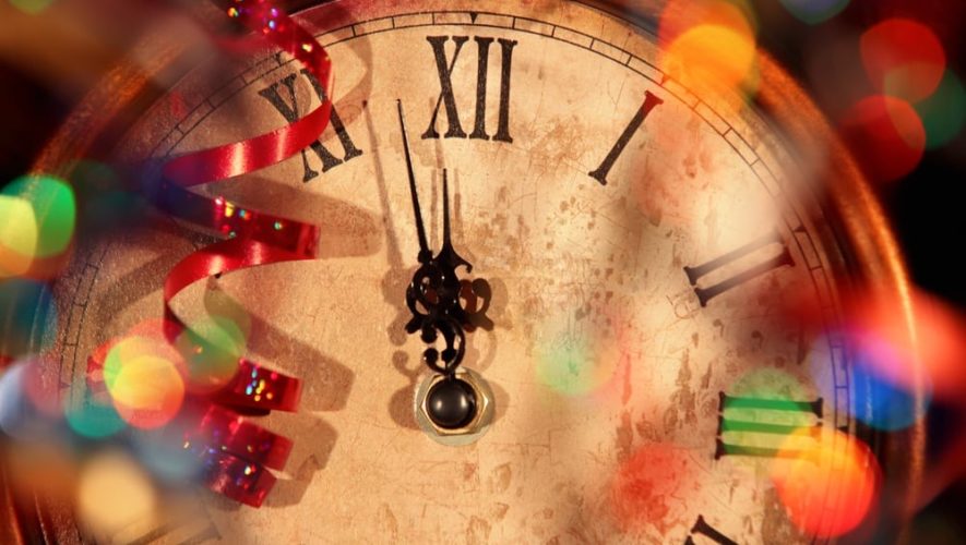 A clock about to strike midnight on New Year's Eve in Gatlinburg cabin rentals.