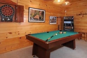 The awesome game room in the Autumn Bearadise cabin in the Smoky Mountains.
