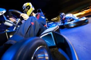 Go kart racing at night.