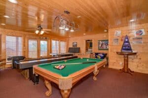 Pool table in entertainment room of Sevierville cabin